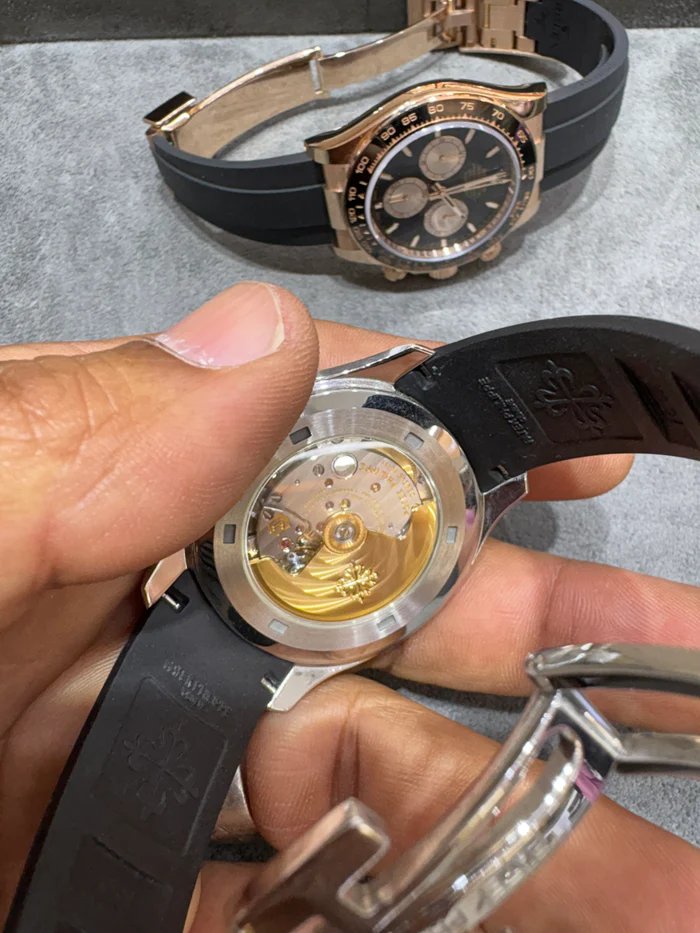 Patek Philippe Nautilus 40mm in 18KT white gold with grey dial and uncut rubber strap